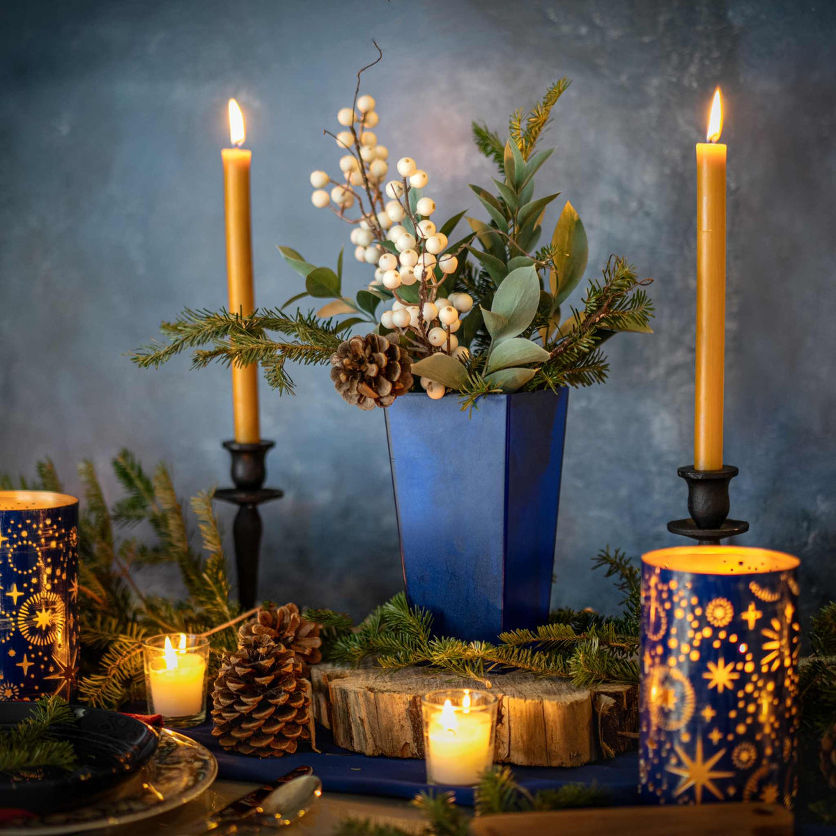 Winter Season Arrangement with Blue Tall tapered Vase