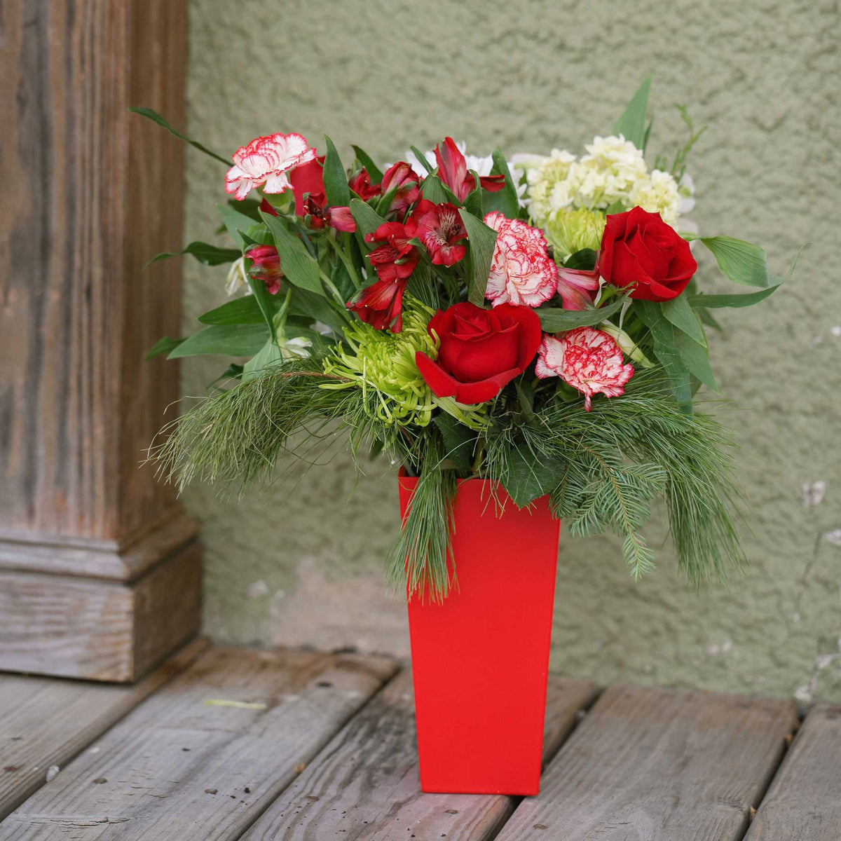 holiday arrangement red vase