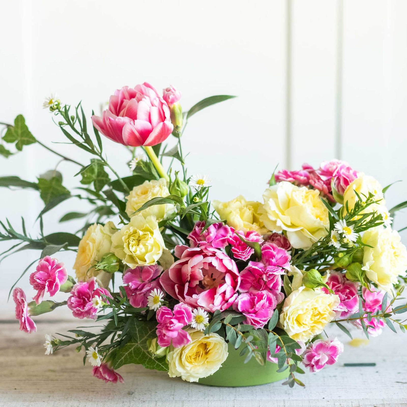Spring Floral arrangement in green wok