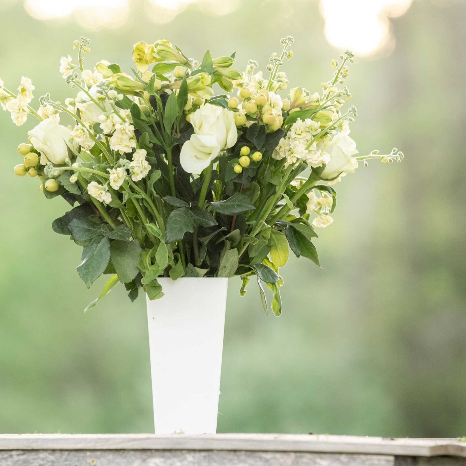 pearl tall tapered vase with spring arrangement