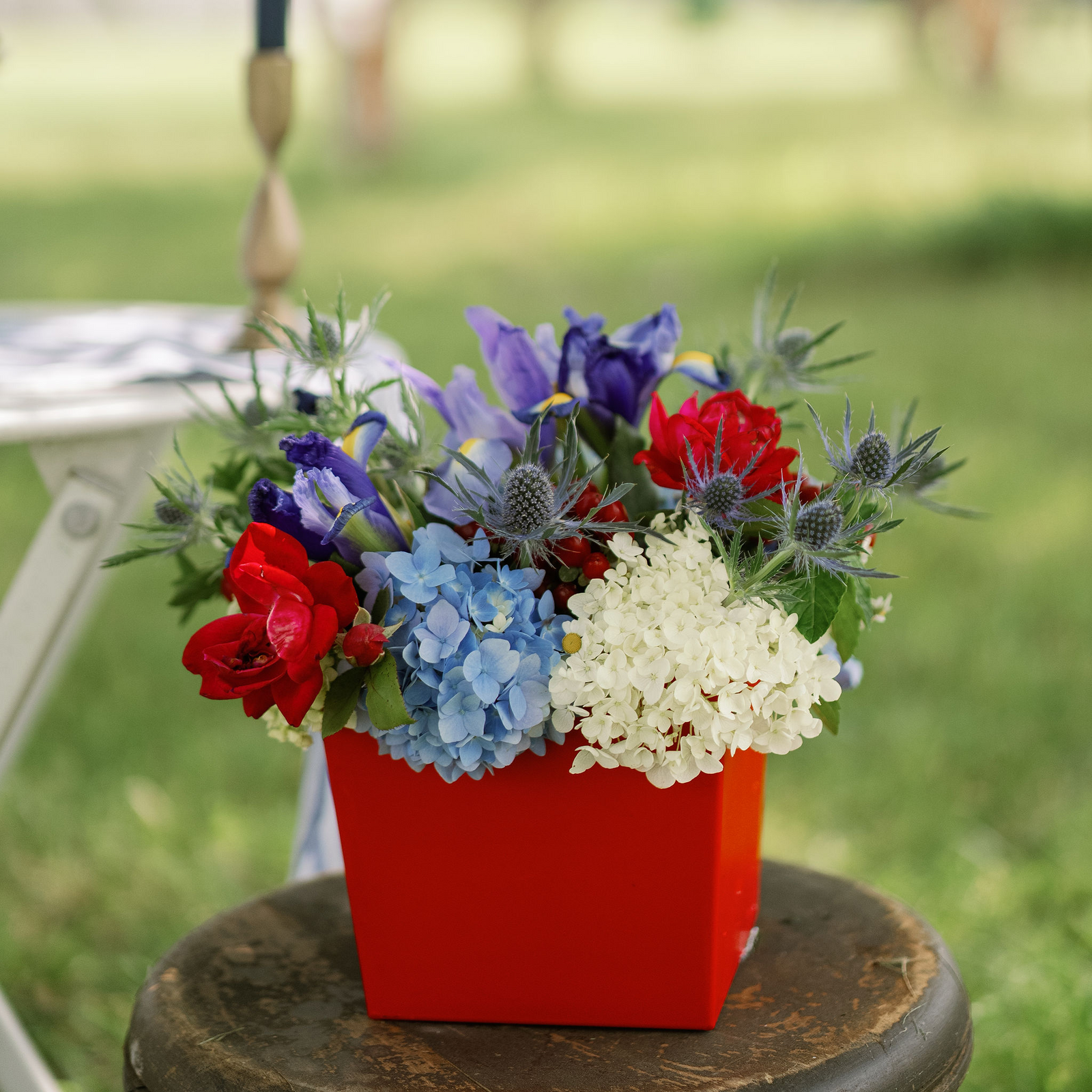 patriotic arrangement in large red cube