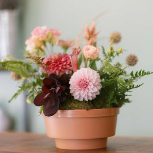 8' Round Clay arrangement with dahlias